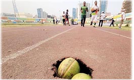 বঙ্গবন্ধু স্টেডিয়ামে ডাবের খোসায় গর্ত ভরাট